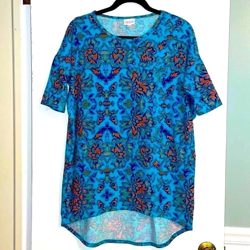 LuLaRoe NWOT aqua and orange print Irma tunic size XXS